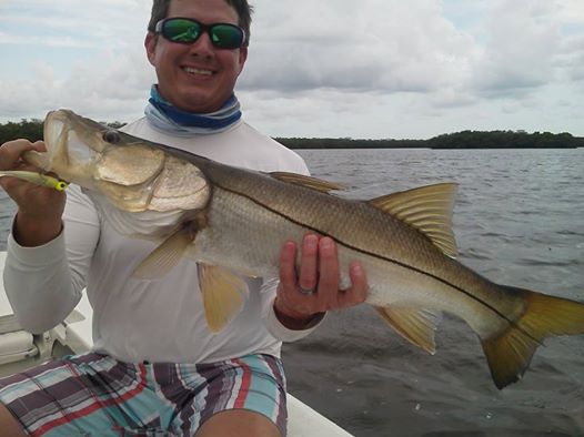 Cliff Davis of Tampa posing for a quick picture with an upper slot snook prior to release.